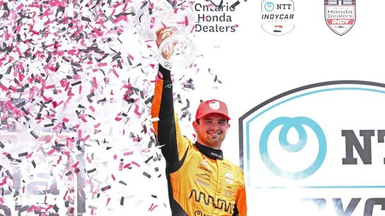 Jul 20, 2025; Toronto, Ontario, CAN; Indycar driver Pato O'Ward (5) celebrates with the trophy after winning the Ontario Honda Dealers Indy at Streets of Toronto.