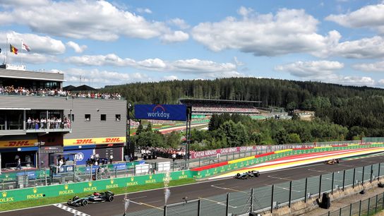 Mercedes drivers George Russell (left) and Lewis Hamilton (right) race to the finish at the Belgium Grand Prix.